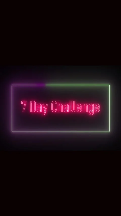 7 day challenge in illuminated rectangular box vertical display. Neon sign .. Stock Footage 314975369