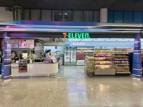 7-Eleven convenience store serving travelers at Don Mueang airport arrival Stock Photos