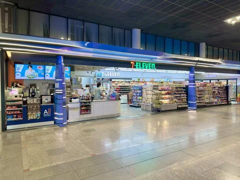 7-Eleven convenience store serving travelers at Don Mueang airport arrival Stock Photos