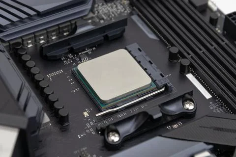 7 nm Computer processor (CPU) inserted in a motherboard socket 写真素材