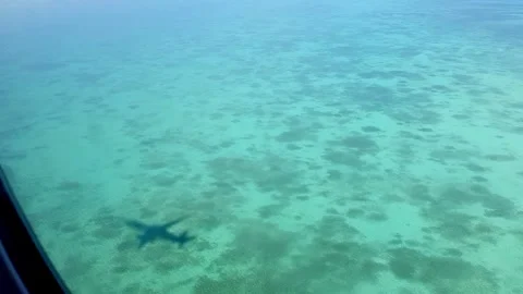 7 ocean from above, flight over the ocean, airplane shadow Stock Footage 266939042