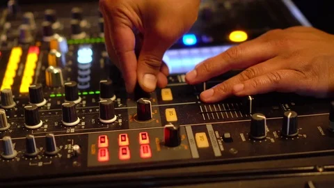 7 Shots: DJ hands playing music, with knobs, buttons and sliders. 스톡 동영상 76188877