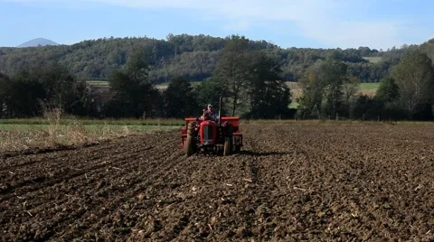 7. Sowing. Seeder in field. Tractor preparing land for planting. Telephoto lens. 스톡 동영상 43159685