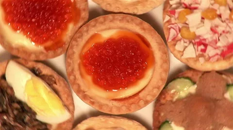 7 tartlets on dish, close-up, (backgrounds) Stock Footage 46457444