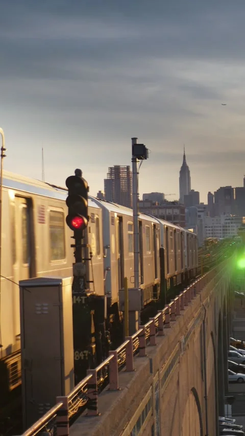 7 Train Heads to Manhattan at Sunset Vertical Stock Footage 342443849