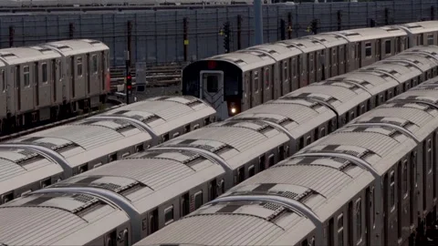 7 Train slowly pulling into train yard 動画素材 265165634