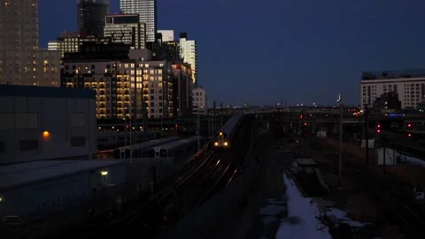 The #7 train at sunset coming into Hunters Point Station Stock Footage 149281500