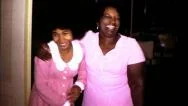 70S Black Mother And Teen Daughter Hug African American Vintage Film Home Movie Stock Footage