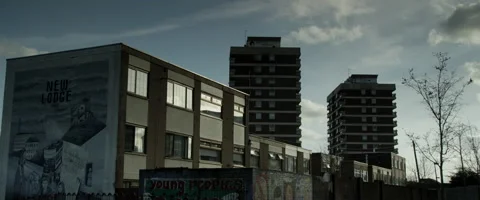 70s TOWER BLOCK COUNCIL FLAT WITH GRAFFITI STREET ART - BELFAST Stock Footage 141600527