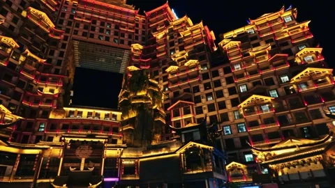 72 Strange Buildings, also known as 72 Qilou, illuminated at night in Stock Footage 345363161