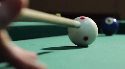 7/35 Man playing billiard. Player is taking a shot and put ball in the hole. Stock Footage 36427160