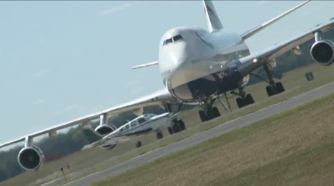 747 vs. Beechcraft Stock Footage 29663959