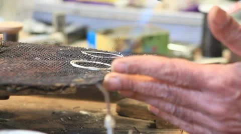 747. welding two ring shaped metal chords Stock Footage 21320885