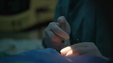 76 Surgeon Administering Eye Injection in Operating Room - Medical Stock Footage Stock Footage 294917229