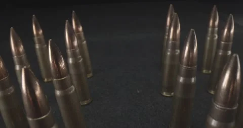 7.62x39 Ammo spread out on table	 Video stock 141005331