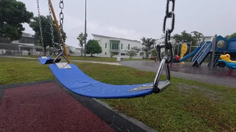 77 Empty children playground during heavy tropical monsoon rain Stock Footage 345488884