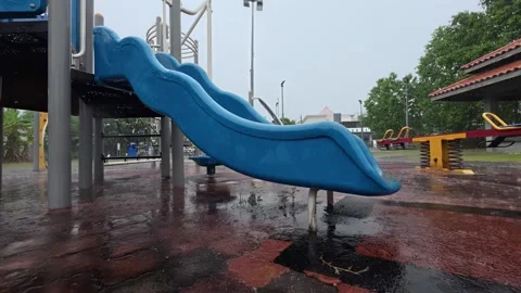 79 Empty children playground with blue wavy plastic slide Stock Footage 345494772