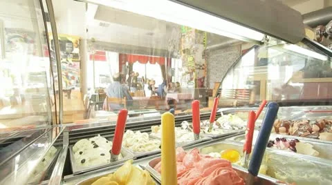 798. looking at a coffee shop interior through an ice cream display window Stock Footage 21349634