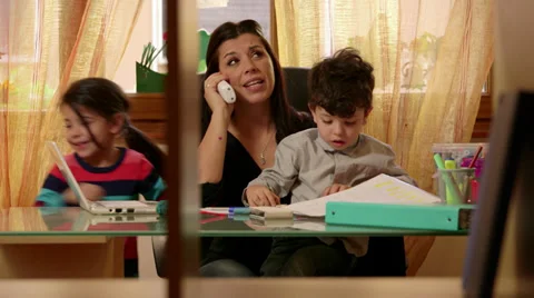 7of15 Little children, girl, boy, woman, business, multitasking mother working Stock Footage