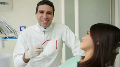 7of19 Dentist visiting patient in dental studio Stock Footage