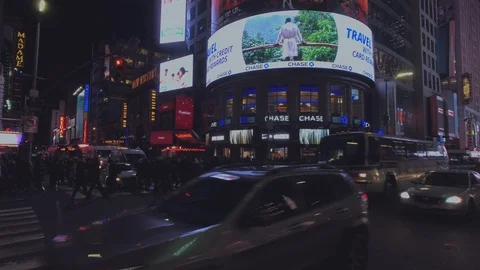 7th Ave/42nd St- Times Square NYC- Vertical Traffic Travels South Along 7th Ave Stock Footage 101308543