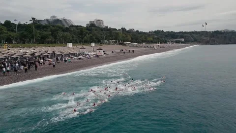 7th may 2023 - Antalya, Turkey. Mass start swim in open water. Stock Footage 243701679