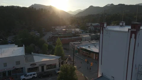 8-1-26, Estes Park, CO, USA - alt sunset flying past theater to downtown Stock Footage 341238936