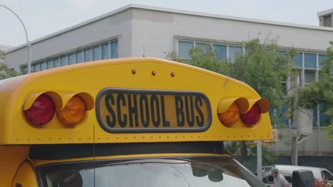 8-13-26, Brooklyn, NY, USA - school bus parked outside of school Stock Footage 342275594
