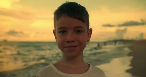 8-9 years boy portrait smiling at camera, cute happy caucasian blond child close Video stock 311027643