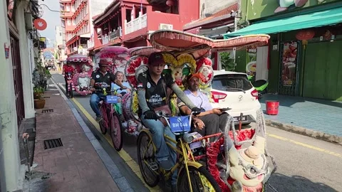 8 Aug 25-Malacca, Malaysia-Tourists Taking Trishaw To Explore Malacca City Stock Footage 336165438