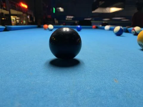 8 ball up close with shadow Stock Photos