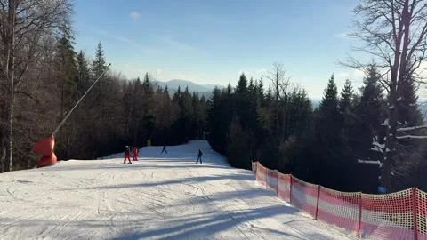 8 Dec 2024, Bukovel, Ukraine. POV. A skier goes down a mountain on a snowy slope Stock Footage 296019802