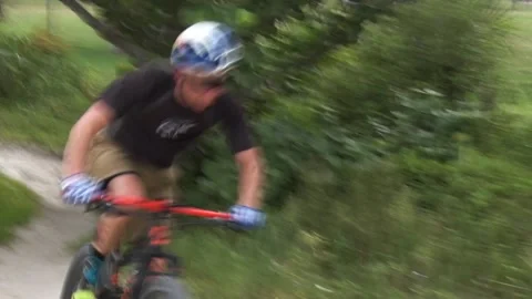 8 Fps Cyclist Rounds Bend Stock Footage 204048615