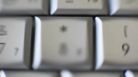 The 8 key on a keyboard quickly comes into focus. Stock Footage 46579046