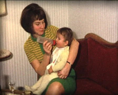 8 mm bottle feeding baby Stock Footage