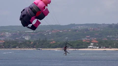 8 Parasailing Tandem for two persons at Tanjumg, Benoa Beach in Bali Stock Footage 133390262