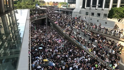 8 Sep 19 Protesters beside Cheung Kong Center, HK Human Rights and Democracy Act Stock Footage 115705729