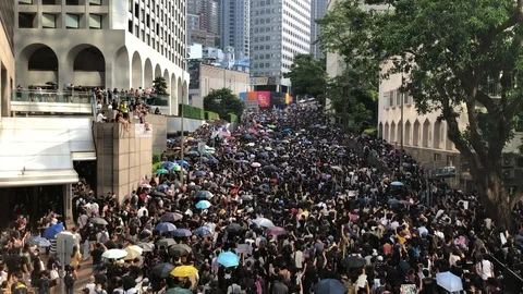 8 Sep 19 Protesters marching to US Consulate, HK Human Rights and Democracy Act Stock Footage 115705918