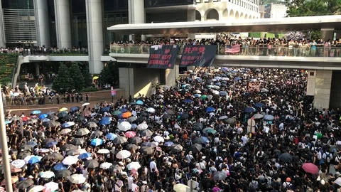 8 Sep 2019 Protesters Chanting 5 Demands, Not 1 Less, Marching to US Consulate Stock Footage 115705726