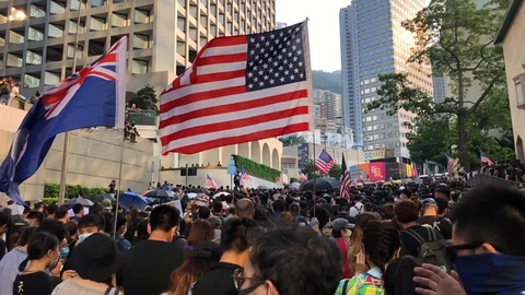 8 Sep 2019  US and HK Flag in slow motion. Urging US to pass the bill H.R.3289 Stock Footage 115706476