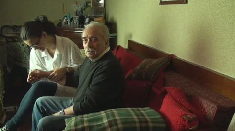 80 Year Old Man Checked Up, By His Medical Student Grand Daughter, Arthritis,Pan Stock Footage 39835188