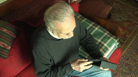 80 Years Old Man Learning To Use A Tablet PC, With Green Screen, Above Shot Stock Footage 39835707