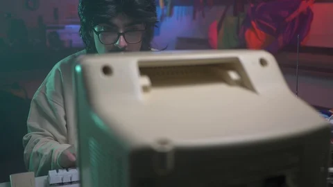 80s 90s Man Using a Vintage Computer at Home Stock Footage 113634123