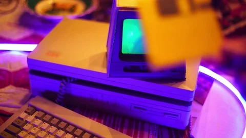 80s computer technology with a floppy disk Stock Footage 86185291
