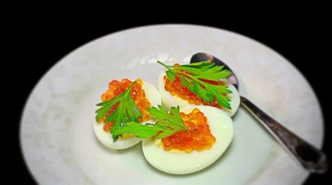 87 Boiled eggs and red caviar Stock Footage 8259222