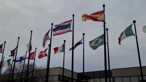 8K 24fps 4320p - 8K sequence of flags waving in the strong winds on cloudy day Stock Footage 129787391