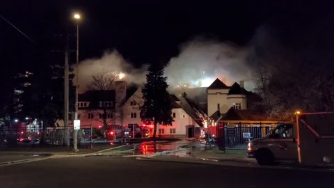 8K 24fps 4320p - Impressive fire inferno at a school's heritage building in Stock Footage 129787554