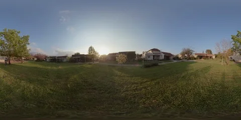 8K 360VR Video Large Green Grass in the middle of a privet homes neighbourhood Stock Footage 105533192