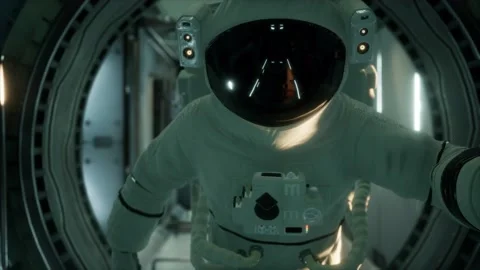 8K astronaut inside the orbital space station Stock Footage 142968864