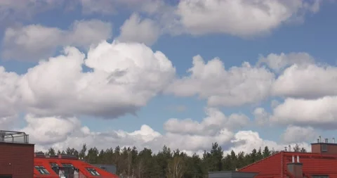 8K Cloud timelapse over a residential area Video stock 239826045
